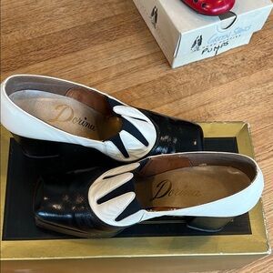 Classic Black and White Heels with Wingtip Design